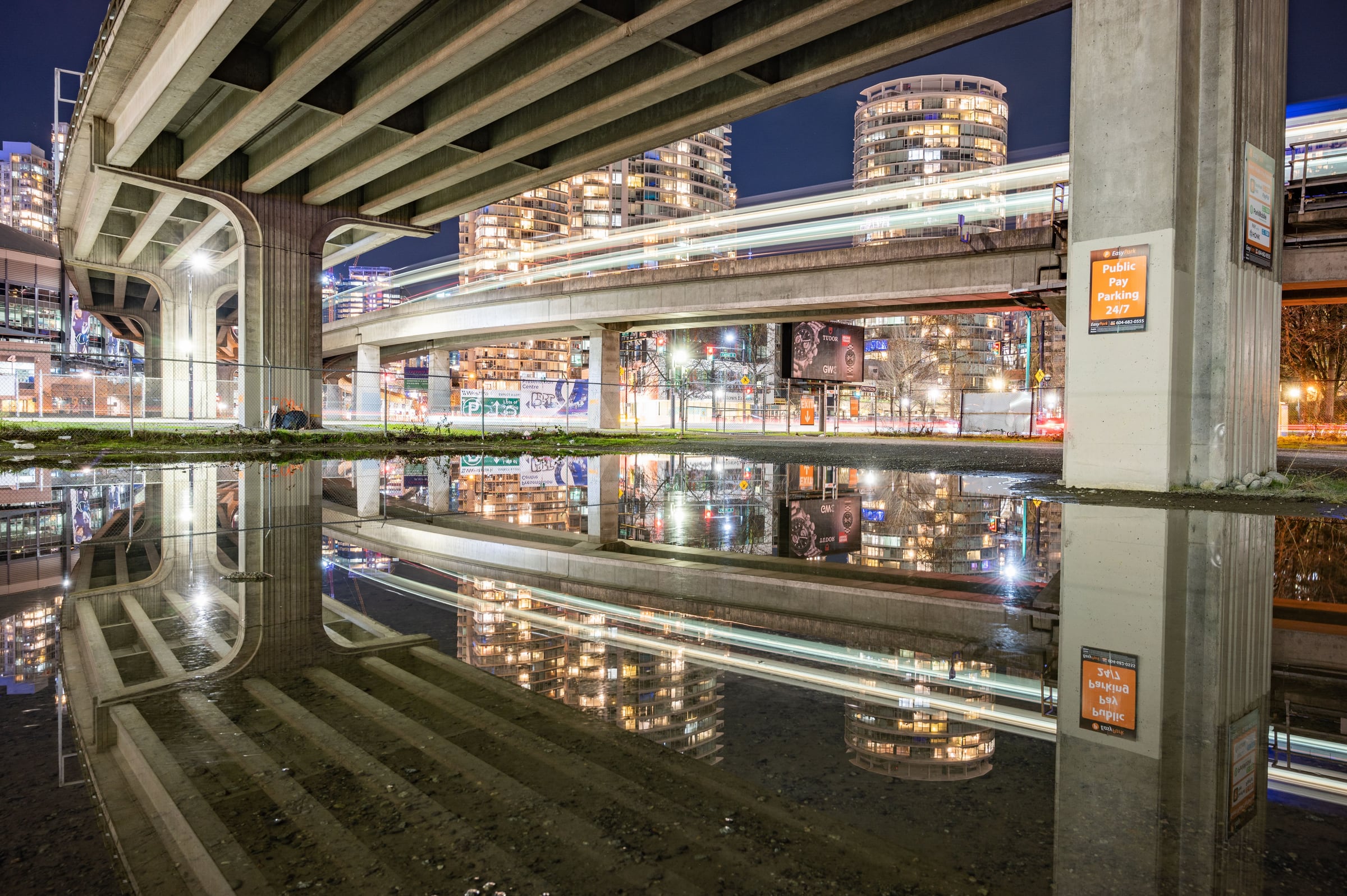 Toronto city surfaces and reflections suggesting the city as source material.
