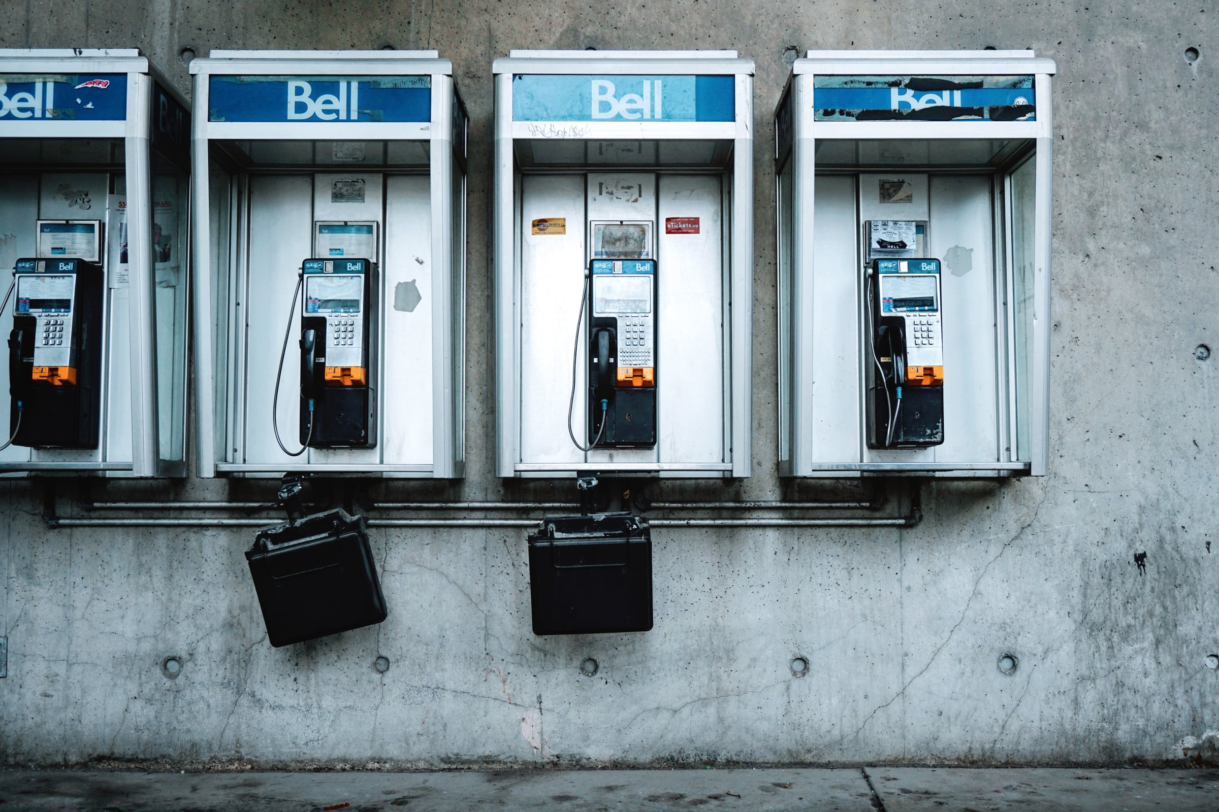 Old Bell telephone booths and urban communication infrastructure.